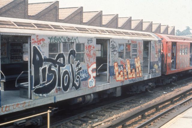 Subway car covered in graffiti in the 1980s